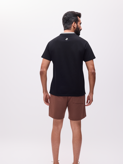 The Groove organic cotton black tshirt with the logo on the reverse